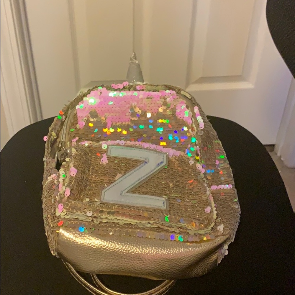 A styling mini unicorn book bag.